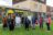 Community and project contributors standing in front of the St Pauls Community Cafe , new outdoor street furniture and colourful murals